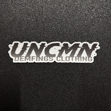 UNCMN / Demings Clothing Sticker SMALL